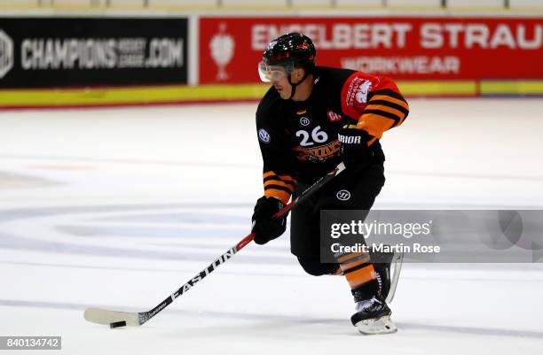 Tyson Mulock of Wolfsburg skates against Banska Bystrica during the Champions Hockey League match between Grizzlys Wolfsburg and HC05 Banska Bystrica...