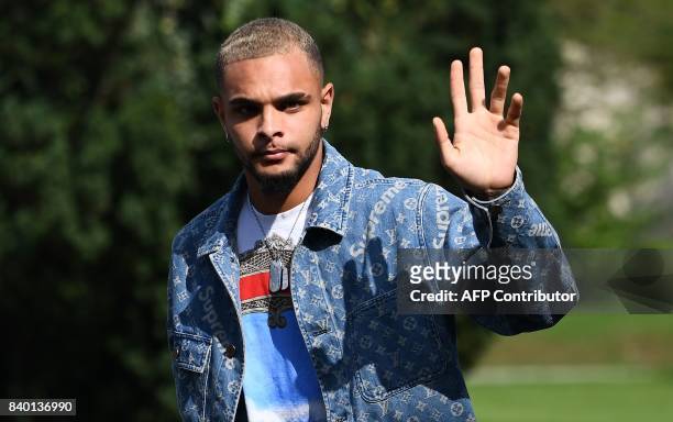 France's defender Layvin Kurzawa arrives at the French national football team training base in Clairefontaine on August 28 as part of the team's...