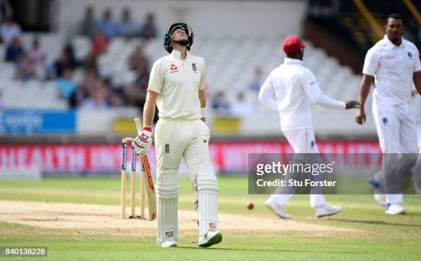 England batsman Joe Root reacts after being dismissed during day four of the 2nd Investec Test Match between England and West Indies at Headingley on...