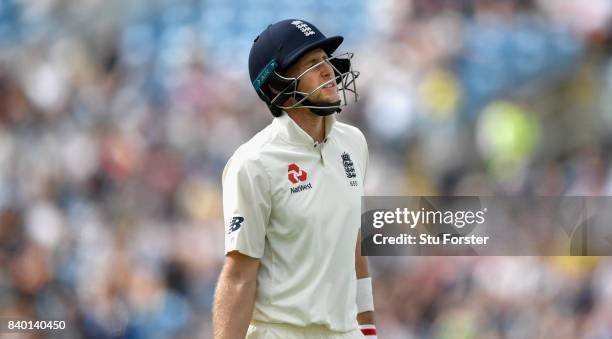 England batsman Joe Root reacts after being dismissed during day four of the 2nd Investec Test Match between England and West Indies at Headingley on...