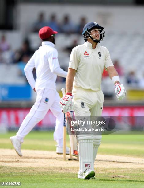 England batsman Joe Root reacts after being dismissed during day four of the 2nd Investec Test Match between England and West Indies at Headingley on...