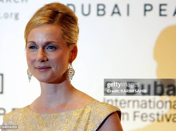 Actress Laura Linney poses for a photograph as she arrives on day two of the fifth edition of the Dubai International Film Festival in Dubai on...