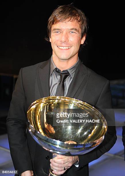 Rally World Champion 2008 Sebastien Loeb of France poses during the 2008 FIA Prize Giving gala, on December 12, 2008 in Monaco. AFP PHOTO POOL VALERY...