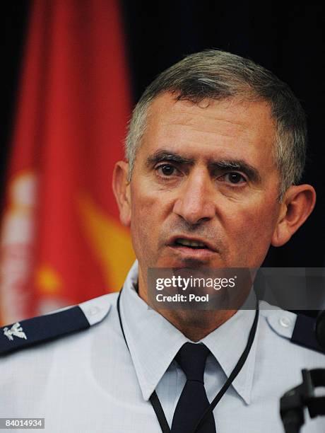 Air Force Col. Pete Masciola, head of the defense team for Canadian-born accused terrorist Omar Khadr, speaks at a news conference at the Camp...