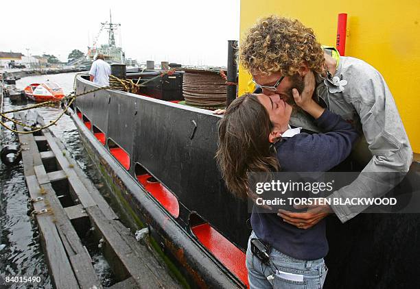 Italian adventurer Alex Bellini , who spent the past 10 months rowing solo across the Pacific Ocean from Peru, kisses his wife Francesca in Newcastle...