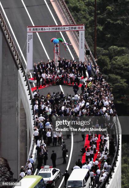 The opening ceremony of the Choyo-ohashi bridge route is held on August 27, 2017 in Minamiaso, Kumamoto, Japan. Quake-damaged bridges were repaired...
