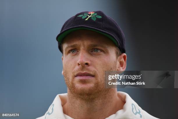 Jos Buttler of Lancashire looks on during the County Championship Division One match between Lancashire and Warwickshire at Old Trafford on August...