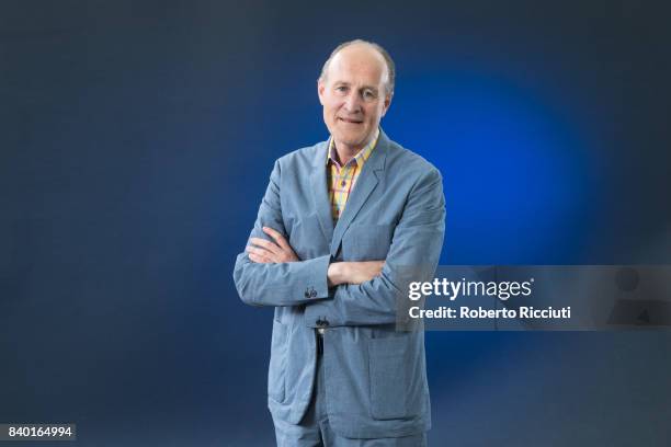 British television producer Sir Peter Bazalgette attends a photocall during the annual Edinburgh International Book Festival at Charlotte Square...