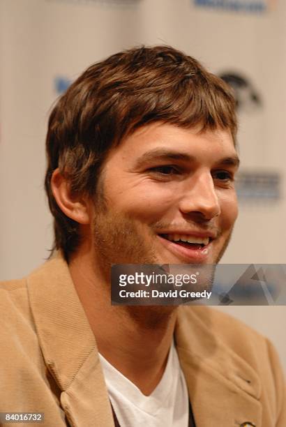 Actor Ashton Kutcher speaks to the media at the premiere of "Personal Effects" on December 12, 2008 at the Englert Theater in Iowa City, Iowa....