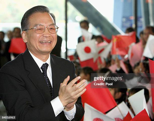 Wen Jiabao, China's premier, arrives at the Kyushu National Museum for a meeting with Lee Myung Bak, South Korea's president, and Taro Aso, Japan's...
