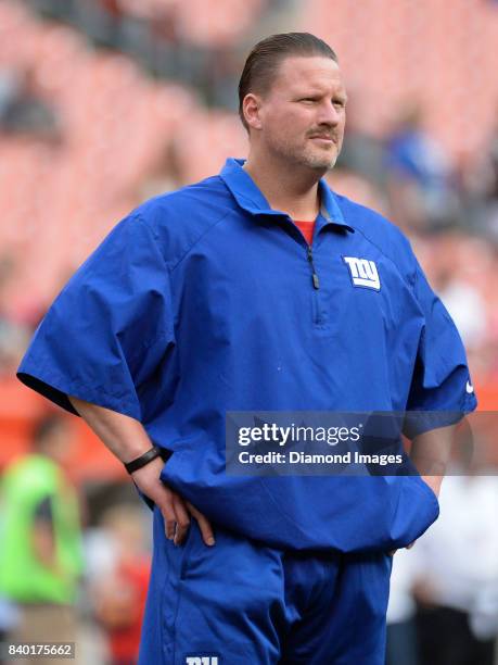 Head coach Ben McAdoo of the New York Giants stands on the field prior to a preseason game on April 27, 2017 against the Cleveland Browns at...