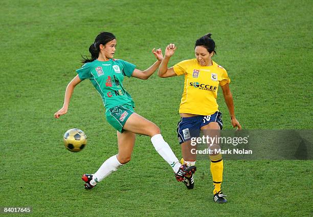Rebecca Kiting of Canberra and Kyah Simon of the Mariners contest possession during the round eight W-League match between the Central Coast Mariners...