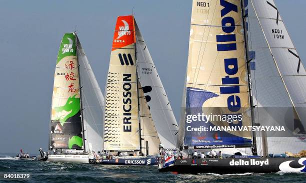 Ericsson 4 , Green Dragon and Delta Lloyd race yachts are seen during the start of the Volvo Ocean Race third leg to Singapore in Cochin on December...