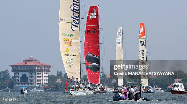 Race yachts take part in a ceremonial parade prior to the start of the Volvo Ocean Race third leg to Singapore in Cochin on December 13, 2008. The...