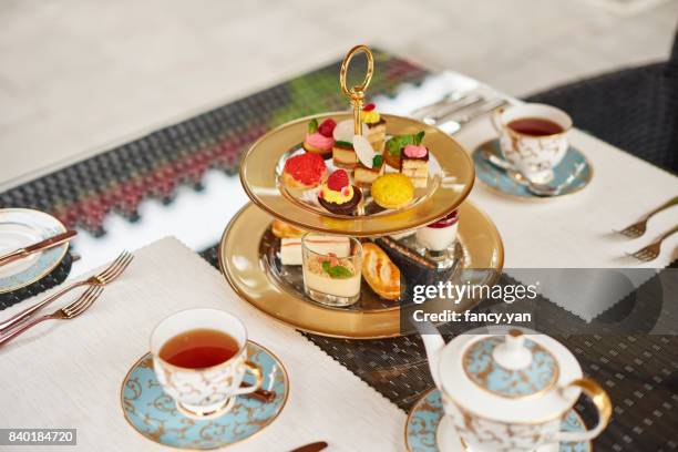 afternoon tea in a garden - english afternoon tea stock pictures, royalty-free photos & images