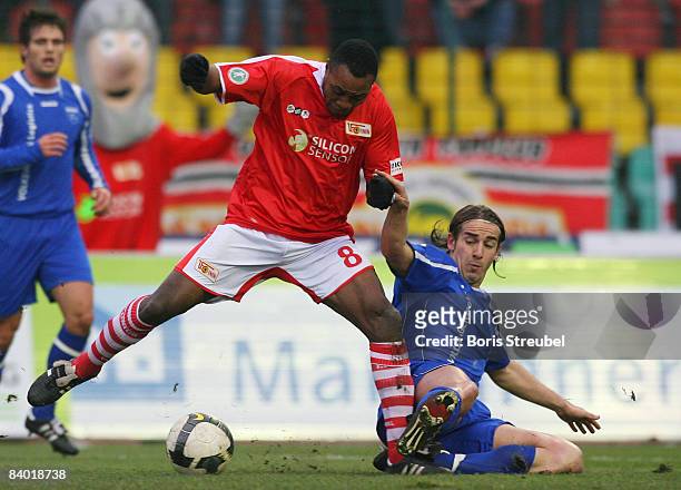 Younga-Mouhani of 1.FC Union Berlin battles for the ball with Bernd Rauw of BSV Kickers Emden during the 3rd Liga match between 1.FC Union Berlin and...