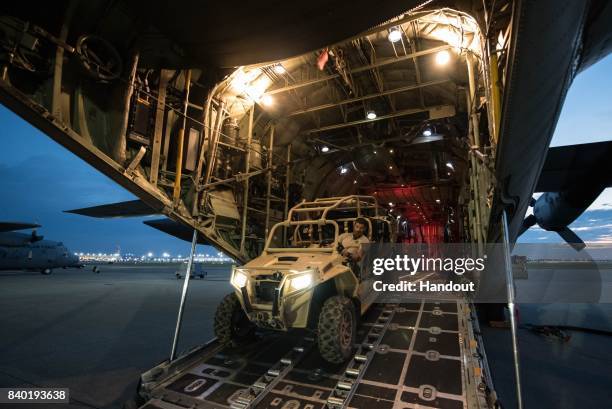 In this handout provided by the U.S. Air National Guard, airmen from the Kentucky Air National Guardâ's 123rd Special Tactics Squadron prepare to...