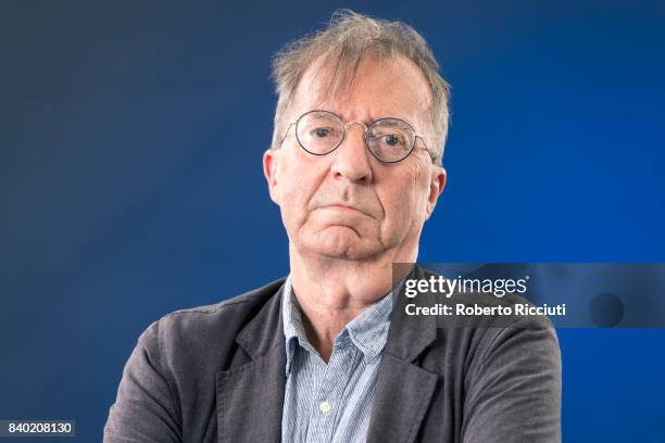 American artist and author Roger Hutchison attends a photocall during the annual Edinburgh International Book Festival at Charlotte Square Gardens on...