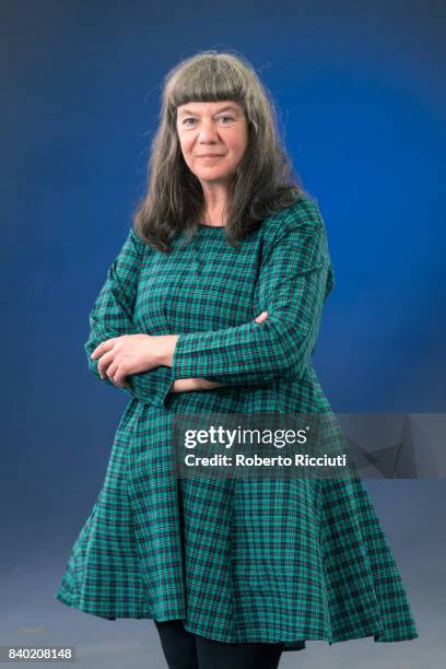 British author Anne Cholawo attends a photocall during the annual Edinburgh International Book Festival at Charlotte Square Gardens on August 28,...