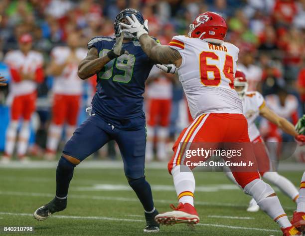 Defensive tackle A.J. Francis of the Seattle Seahawks battles Damien Mama of the Kansas City Chiefs at CenturyLink Field on August 25, 2017 in...
