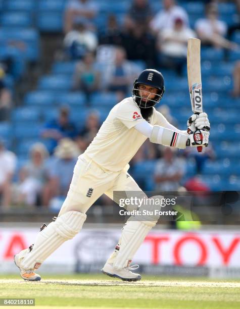 England batsman Moeen Ali hits out during day four of the 2nd Investec Test Match between England and West Indies at Headingley on August 28, 2017 in...