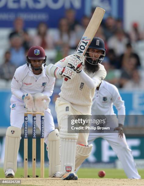 Moeen Ali of England hits out during the fourth day of the 2nd Investec Test match between England and the West Indies at Headingley cricket ground...