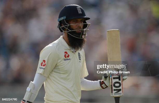 Moeen Ali of England leaves the field after being dismissed during the fourth day of the 2nd Investec Test match between England and the West Indies...