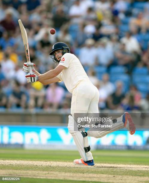 England batsman Chris Woakes hits out during day four of the 2nd Investec Test Match between England and West Indies at Headingley on August 28, 2017...