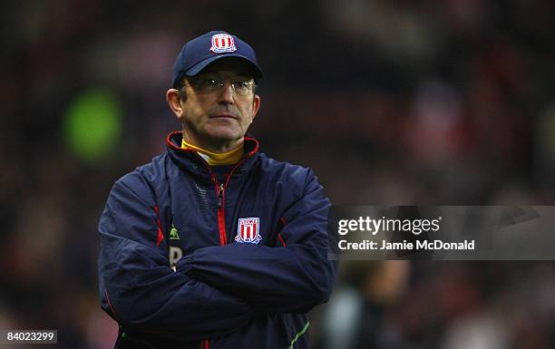 Stoke's manager Tony Pulis looks on during the Barclays Premier League match between Stoke City and Fulham at the Britannia Stadium on December 13,...