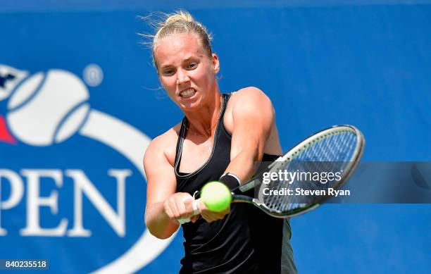 Richel Hogenkamp of the Netherlands returns a shot to Arina Rodionova of Australia on Day One of the 2017 US Open at the USTA Billie Jean King...