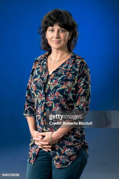 Bulgarian poet and writer Kapka Kassabova attends a photocall during the annual Edinburgh International Book Festival at Charlotte Square Gardens on...