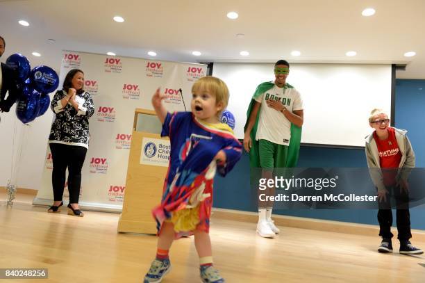 Boston Celtic Jayson Tatum, Matthias, and Evelyn show of their superhero poses during Day of Joy Celebration at Boston Children's Hospital August 28,...