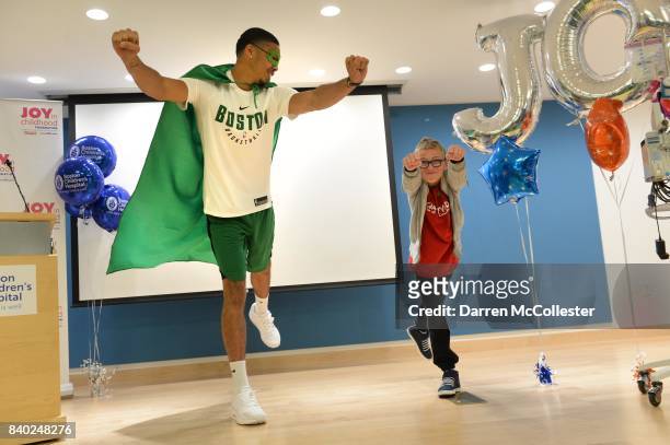 Boston Celtic Jayson Tatum and Matthias show of their super hero poses during Day of Joy Celebration at Boston Children's Hospital August 28, 2017 in...