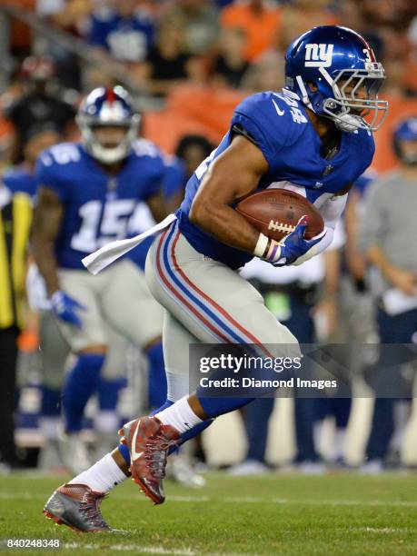 Running back Shane Vereen of the New York Giants carries the ball in the second quarter of a preseason game on April 27, 2017 against the Cleveland...