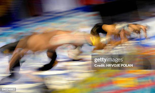 Swimmers jump in the pool at the beginning of men�s 200m butterfly final race, during the European Short Course Swimming Championships in Rijeka on...