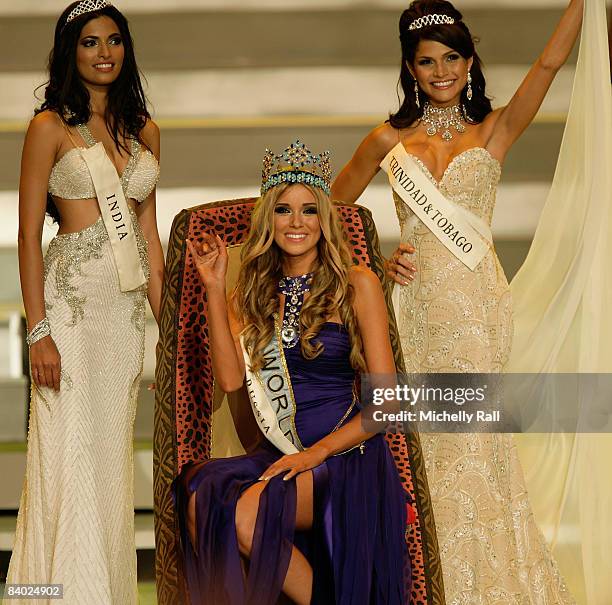 Winner of Miss World, Ksenyia Sukhinova of Russia, flanked by Miss India Parvathy Omanakuttan and Miss Trinidad & Tobago Gabrielle Walcott on stage...