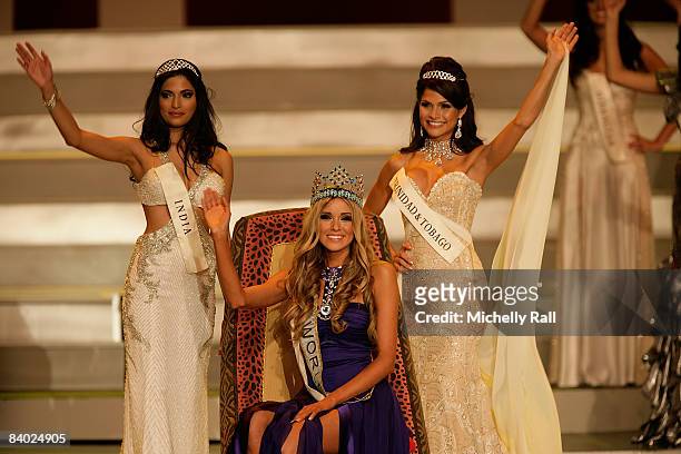 Winner of Miss World, Ksenyia Sukhinova of Russia, flanked by Miss India Parvathy Omanakuttan and Miss Trinidad & Tobago Gabrielle Walcott on stage...