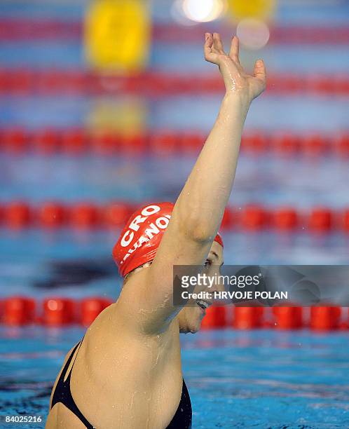 Sanja Jovanovic of Croatia celebrates after winning the women's 50m backstroke final race, during the European Short Course Swimming Championships in...