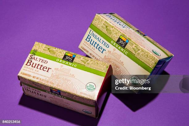 Packages of Whole Foods Market Inc. 365 brand organic salted and unsalted butter are arranged for a photograph in New York, U.S., on Friday, Aug. 25,...