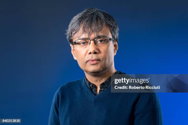 Indian novelist, poet, essayist, literary critic, editor, singer and music composer Amit Chaudhuri attends a photocall during the annual Edinburgh...