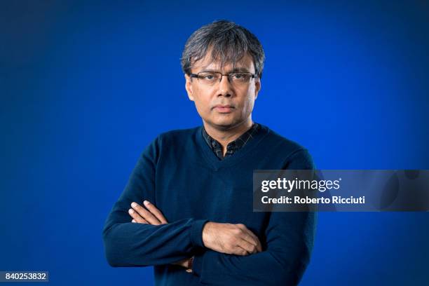 Indian novelist, poet, essayist, literary critic, editor, singer and music composer Amit Chaudhuri attends a photocall during the annual Edinburgh...