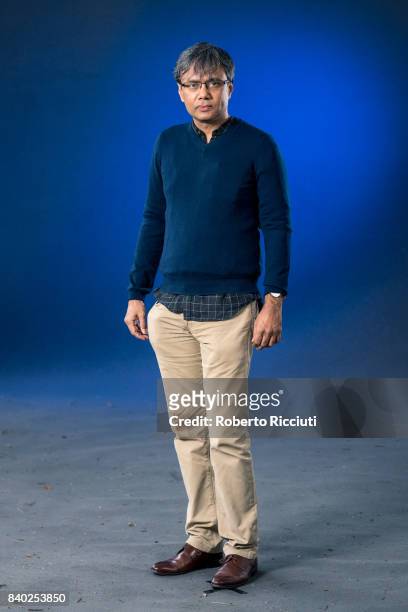 Indian novelist, poet, essayist, literary critic, editor, singer and music composer Amit Chaudhuri attends a photocall during the annual Edinburgh...