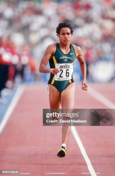 Cathy Freeman of Australia runs in a semifinal of race of the Women's 400 meter event of the 1999 IAAF World Championships on August 24, 1999 at the...