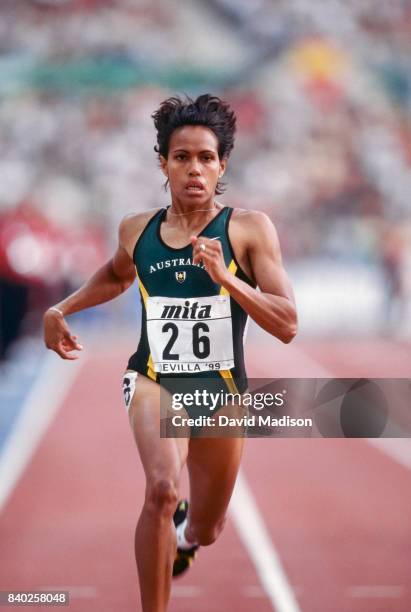 Cathy Freeman of Australia runs in a semifinal of race of the Women's 400 meter event of the 1999 IAAF World Championships on August 24, 1999 at the...