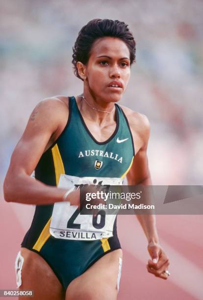 Cathy Freeman of Australia runs in a semifinal of race of the Women's 400 meter event of the 1999 IAAF World Championships on August 24, 1999 at the...