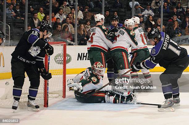 Niklas Backstrom of the Minnesota Wild cannot stop a shot on goal from Anze Kopitar of the Los Angeles Kings on December 13, 2008 at Staples Center...