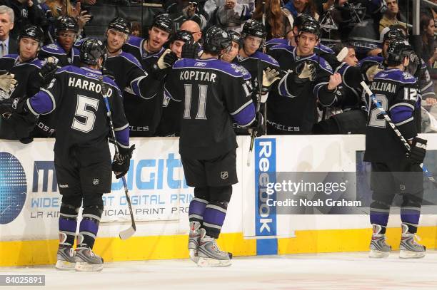 The Los Angeles Kings celebrate a goal from teammate Anze Kopitar during the first period of the game against the Minnesota Wild on December 13, 2008...