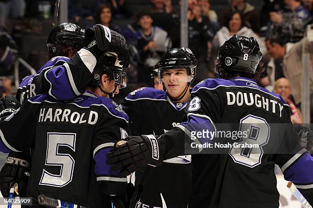 The Los Angeles Kings celebrate a goal from teammate Anze Kopitar during the first period of the game against the Minnesota Wild on December 13, 2008...