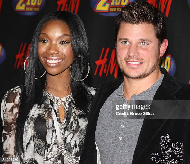 Brandy and Nick Lachey pose in the press room during Z100's Jingle Ball at Madison Square Garden on December 12, 2008 in New York City.