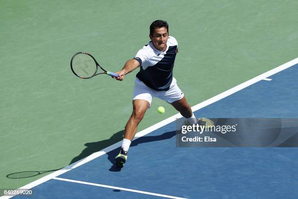 Nicolas Almagro of Spain returns a shot during his first round Men's Singles match against Steve Johnson of the United States on Day One of the 2017...